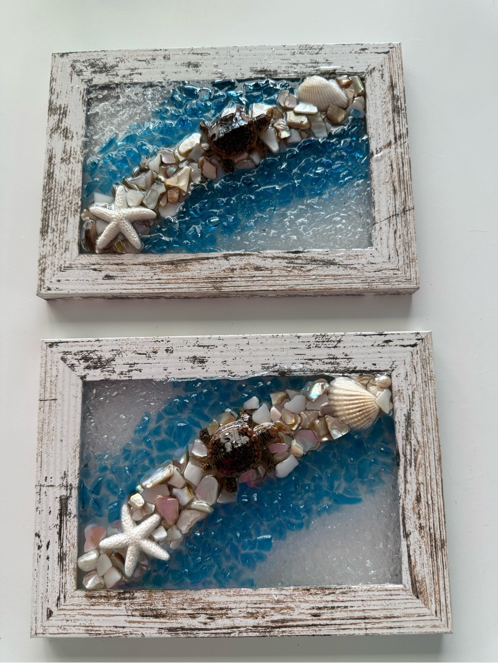 Handmade resin Art with shells and blue and clear glass